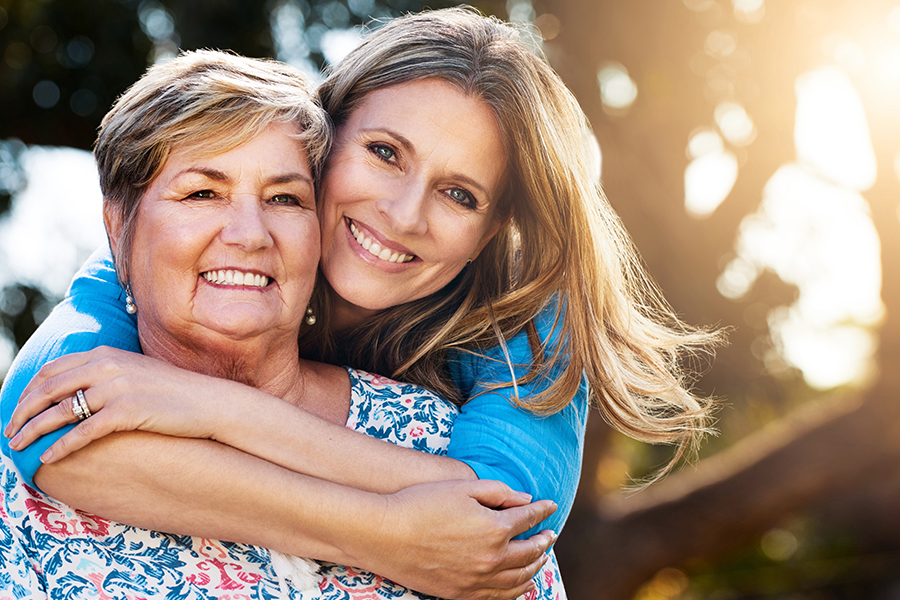 mother and daughter holding each other