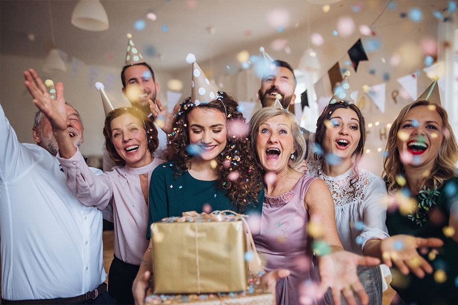 a group of colleague celebrate a birthday